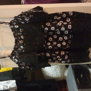 Black daisy shirt with off the shoulder sleeves